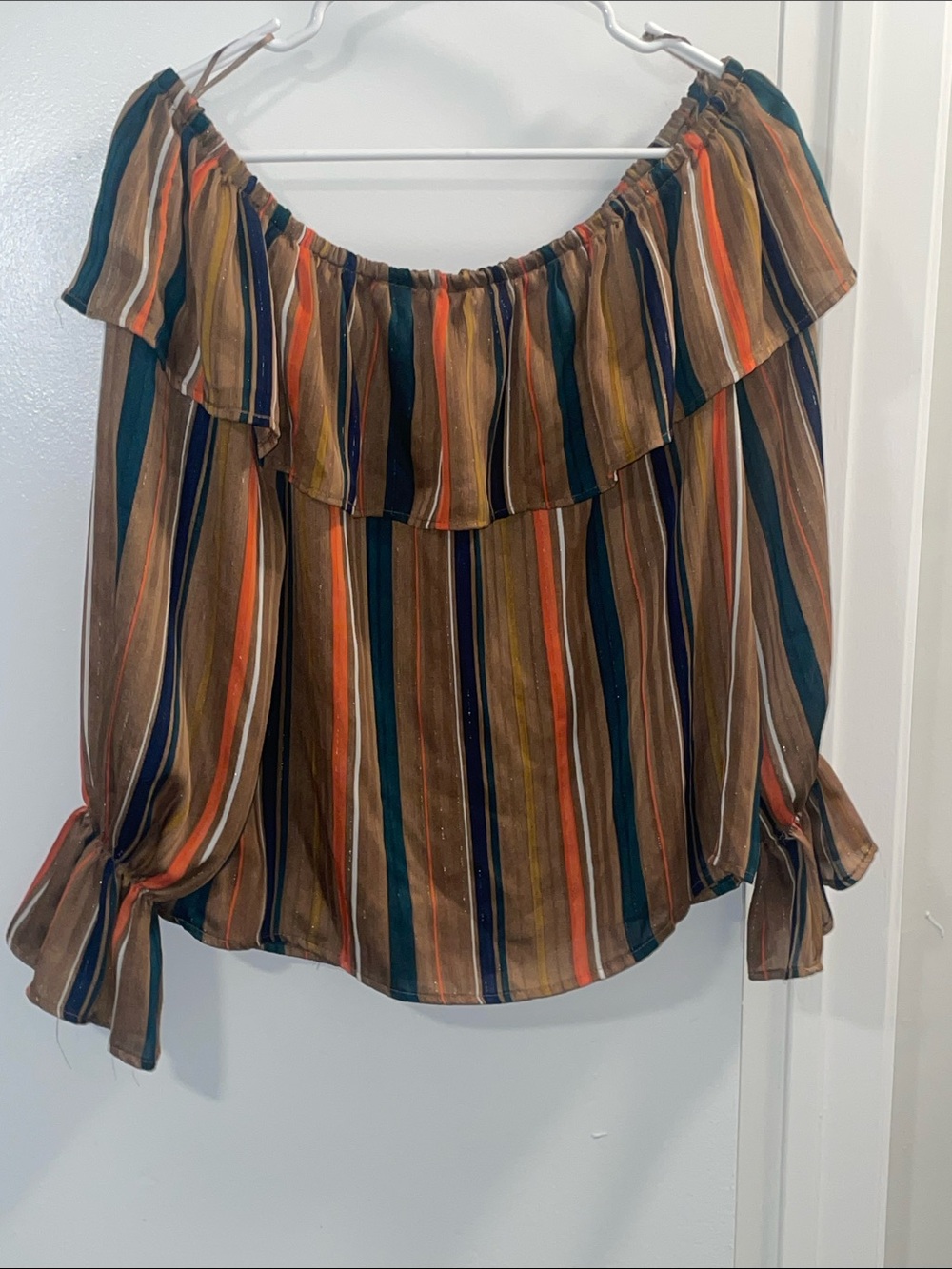 Women’s size medium off the shoulder boutique top with bell sleeves